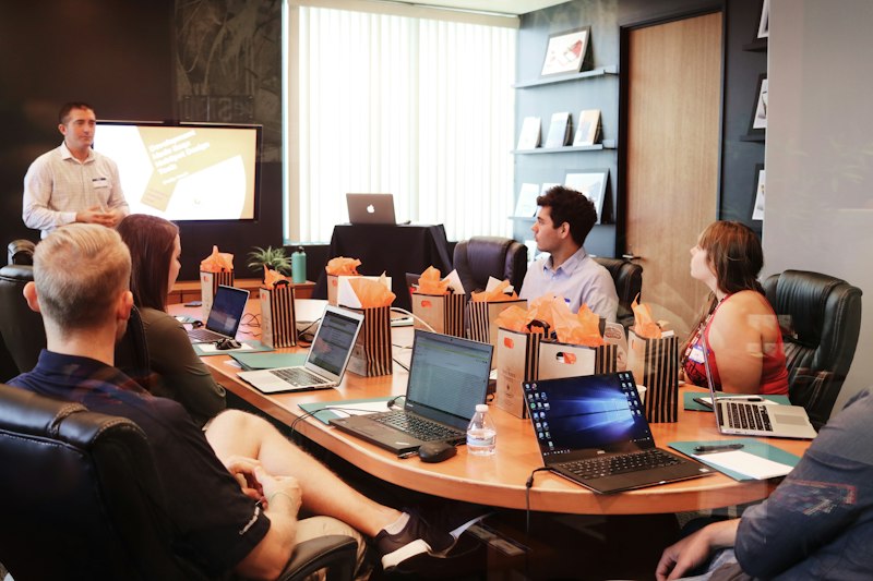 Professional corporate strategy meeting with data analytics